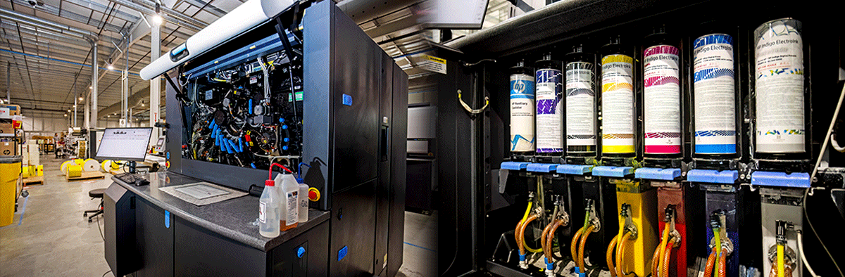 An HP Indigo label press open with the interior where the color ink cannisters are housed.